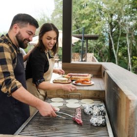 grilling in outdoor kitchen